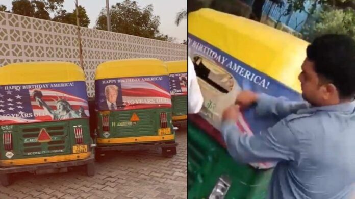 delhi-trump-posters-torn-auto-protest : Delhi auto-rickshaw with removed campaign poster