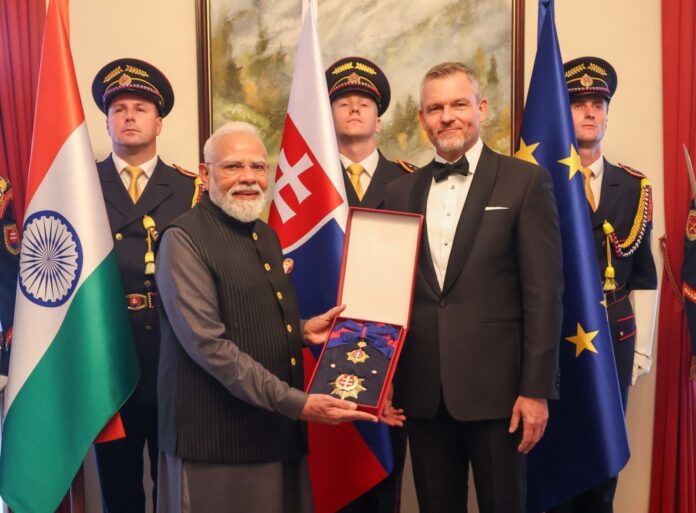 PM Modi receiving Order of the White Double Cross PM Modi receiving Order of the White Double Cross