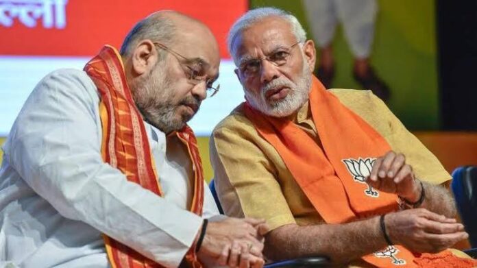Prime Minister Narendra Modi with Union Cabinet ministers during an official meeting.